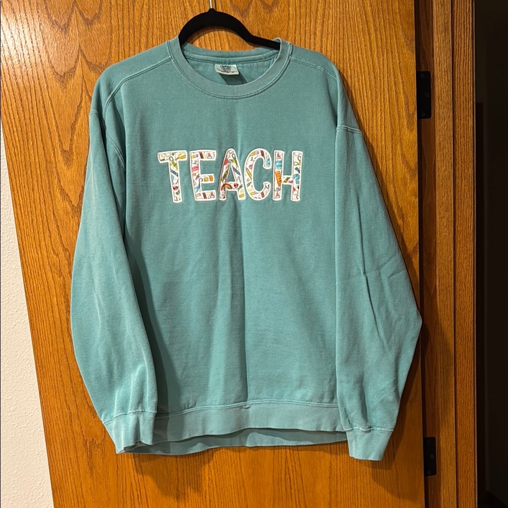 “TEACH” embroidered sweatshirt